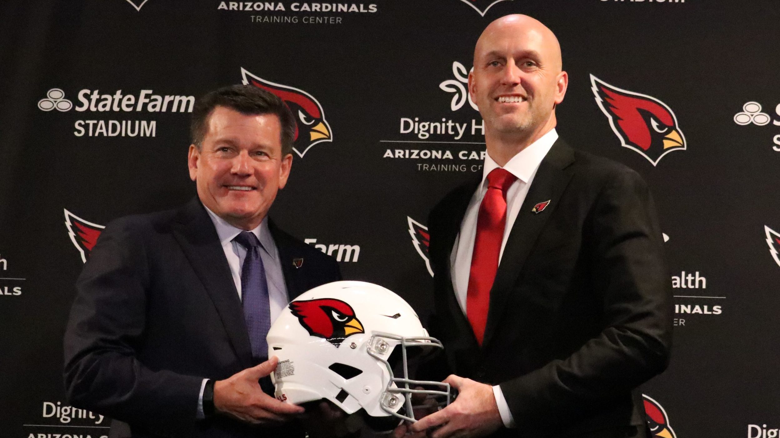 Arizona Cardinals owner Michael Bidwill and general manager Monti Ossenfort pose for a photo during...