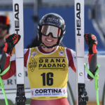 
              Austria's Cornelia Huetter celebrates after completing an alpine ski, women's World Cup super-G, in Cortina d'Ampezzo, Italy, Sunday, Jan. 22, 2023. (AP Photo/Alessandro Trovati)
            