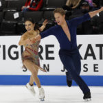 Madison Chock, left, and Evan Bates perform during the rhythm dance program at the U.S. figure skating championships in San Jose, Calif., Thursday, Jan. 26, 2023. (AP Photo/Josie Lepe)