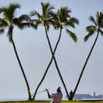 
              Sungjae Im, of South Korea hits his approach form the 16th fairway during the second round of the Sony Open golf tournament, Friday, Jan. 13, 2023, at Waialae Country Club in Honolulu. (AP Photo/Matt York)
            
