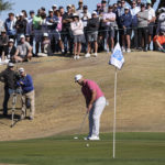 Jon Rahm putts on the fifth hole during the final round of the American Express golf tournament on the Pete Dye Stadium Course at PGA West Sunday, Jan. 22, 2023, in La Quinta, Calif. (AP Photo/Mark J. Terrill)
