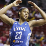 
              Minnesota Lynx's Maya Moore in action against the Seattle Storm in the first half of a WNBA basketball game, Sept. 10, 2013, in Seattle. Moore has officially decided to retire from playing basketball, making her announcement on “Good Morning America” on Monday, Jan. 16, 2023. (AP Photo/Elaine Thompson)
            