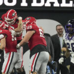 Georgia tight end Brock Bowers (19) celebrates his touchdown with his teammates against TCU during the second half of the national championship NCAA College Football Playoff game, Monday, Jan. 9, 2023, in Inglewood, Calif. (AP Photo/Mark J. Terrill)