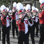 
              The University of Utah Marching Band marches at the 134th Rose Parade in Pasadena, Calif., Monday, Jan. 2, 2023. (AP Photo/Michael Owen Baker)
            