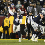 Dallas Cowboys quarterback Dak Prescott (4) throwing the ball downfield during the second half an NFL football game against the Washington Commanders, Sunday, Jan. 8, 2023, in Landover, Md. (AP Photo/Nick Wass)