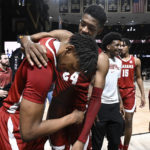 
              Alabama forwards Brandon Miller (24) and Noah Gurley celebrate after the team's NCAA college basketball game against Vanderbilt on Tuesday, Jan. 17, 2023, in Nashville, Tenn. Alabama won 78-66. (AP Photo/John Amis)
            