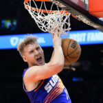 Phoenix Suns' Jock Landale celebrates a dunk against the Indiana Pacers during the second half of an NBA basketball game in Phoenix, Saturday, Jan. 21, 2023. (AP Photo/Darryl Webb)