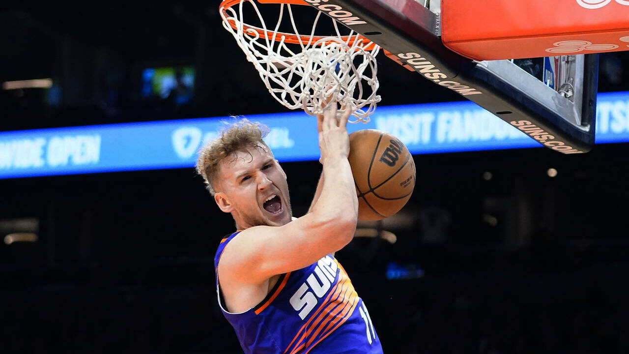Phoenix Suns' Jock Landale celebrates a dunk against the Indiana Pacers during the second half of a...