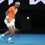 Rafael Nadal of Spain reacts during his second round match against Mackenzie McDonald of the U.S., at the Australian Open tennis championship in Melbourne, Australia, Wednesday, Jan. 18, 2023. (AP Photo/Dita Alangkara)