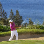 
              Collin Morikawa hits from the bunker on the 12th green during the second round of the Tournament of Champions golf event, Friday, Jan. 6, 2023, at Kapalua Plantation Course in Kapalua, Hawaii. (AP Photo/Matt York)
            