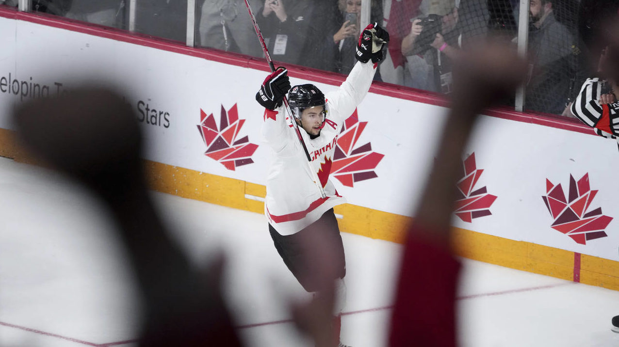 Canada's Dylan Guenther reacts after scoring the winning goal against Czechia in overtime in the ti...