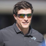 
              FILE - Former Carolina Panthers and Boston College football player Luke Kuechly watches warm ups before an NFL football game between the Carolina Panthers and the Tampa Bay Buccaneers Sunday, Oct. 23, 2022, in Charlotte, N.C. Kuechly was elected to the College Football Hall of Fame on Monday, Jan. 9, 2023. (AP Photo/Jacob Kupferman, File)
            