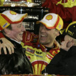 
              FILE - NASCAR Daytona 500 winner Kevin Harvick, center, celebrates with car owner Richard Childress, left, in victory lane at Daytona International Speedway in Daytona Beach, Fla., Sunday, Feb. 18, 2007. The person at right is not identified. Kevin Harvick said Thursday, Jan. 12, 2023, he will retire from NASCAR competition at the end of the 2023 season. (AP Photo/John Raoux, File)
            