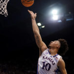 
              Kansas forward Jalen Wilson shoots during the first half of an NCAA college basketball game against Kansas State Tuesday, Jan. 31, 2023, in Lawrence, Kan. (AP Photo/Charlie Riedel)
            