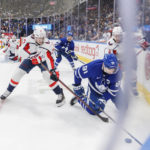 
              Toronto Maple Leafs centre John Tavares (91) tries to gain control of the puck in the corner against Washington Capitals center Dylan Strome (17) during the second period of an NHL hockey game in Toronto on Sunday, Jan. 29, 2023. (Cole Burston/The Canadian Press via AP)
            