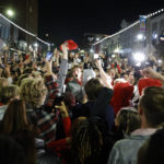 
              Georgia students celebrate in the streets after the NCAA College Football Playoff national championship game  against TCU, Monday, Jan. 9, 2023, in Athens, Ga. (AP Photo/Alex Slitz)
            