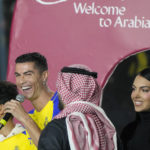 
              Cristiano Ronaldo and Georgina Rodriguez attend the official unveiling as a new member of Al Nassr soccer club in in Riyadh, Saudi Arabia, Tuesday, Jan. 3, 2023. Ronaldo, who has won five Ballon d'Ors awards for the best soccer player in the world and five Champions League titles, will play outside of Europe for the first time in his storied career. (AP Photo/Amr Nabil)
            
