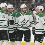 
              The Dallas Stars celebrate after center Tyler Seguin (91) scored during the first period of an NHL hockey game against the Los Angeles Kings Thursday, Jan. 19, 2023, in Los Angeles. (AP Photo/Ashley Landis)
            