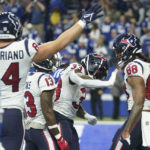 
              Houston Texans tight end Jordan Akins (88) is congratulated after scoring a two-point conversion during the second half of an NFL football game between the Houston Texans and Indianapolis Colts, Sunday, Jan. 8, 2023, in Indianapolis. (AP Photo/Darron Cummings)
            