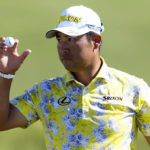
              Hideki Matsuyama, of Japan, acknowledges the gallery from the 18th green during the final round of the Tournament of Champions golf event, Sunday, Jan. 8, 2023, at Kapalua Plantation Course in Kapalua, Hawaii. (AP Photo/Matt York)
            