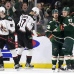 Minnesota Wild right wing Mats Zuccarello (36) is congratulated by left wing Kirill Kaprizov (97) for a goal, as Arizona Coyotes defenseman J.J. Moser (90) and center Nick Bjugstad (17) skate off during the second period of an NHL hockey game Saturday, Jan. 14, 2023, in St. Paul, Minn. (AP Photo/Andy Clayton-King)