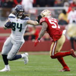Seattle Seahawks tight end Colby Parkinson (84) runs against San Francisco 49ers linebacker Dre Greenlaw (57) during the second half of an NFL wild card playoff football game in Santa Clara, Calif., Saturday, Jan. 14, 2023. (AP Photo/Jed Jacobsohn)