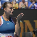 Aryna Sabalenka of Belarus reacts after defeating Donna Vekic of Croatia in their quarterfinal match at the Australian Open tennis championship in Melbourne, Australia, Wednesday, Jan. 25, 2023. (AP Photo/Aaron Favila)