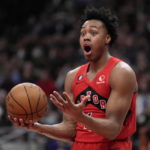 Toronto Raptors forward Scottie Barnes reacts after initially being called for a foul during first-half NBA basketball game action against the Portland Trail Blazers in Toronto, Sunday, Jan. 8, 2023. The foul was charged to guard Fred VanVleet after a review. (Frank Gunn/The Canadian Press via AP)
