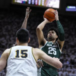 
              Michigan State forward Malik Hall (25) shoots over Purdue center Zach Edey (15) during the first half of an NCAA college basketball game in West Lafayette, Ind., Sunday, Jan. 29, 2023. (AP Photo/Michael Conroy)
            