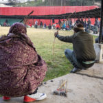 
              Archers shoot at a hay target at an archery event in Shillong, India, Monday, Jan. 16, 2023. Each afternoon, except on Sundays and public holidays, this event takes place in a small field and people place bets on the results. (AP Photo/Ashwini Bhatia)
            
