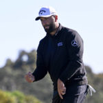 
              Jon Rahm, of Spain, pumps his fist after making a birdie putt on the eighth hole of the North Course at Torrey Pines during the second round of the Farmers Insurance Open golf tournament, Thursday, Jan. 26, 2023, in San Diego. (AP Photo/Denis Poroy)
            