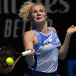 
              Katerina Siniakova of the Czech Republic plays a forehand return to Coco Gauff of the U.S. during their first round match at the Australian Open tennis championship in Melbourne, Australia, Monday, Jan. 16, 2023. (AP Photo/Aaron Favila)
            