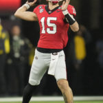 Georgia quarterback Carson Beck (15) passes in the pocket against TCU during the second half of the national championship NCAA College Football Playoff game, Monday, Jan. 9, 2023, in Inglewood, Calif. (AP Photo/Ashley Landis)