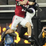 Georgia tight end Brock Bowers (19) makes a touchdown catch against TCU safety Abraham Camara (14) during the second half of the national championship NCAA College Football Playoff game, Monday, Jan. 9, 2023, in Inglewood, Calif. (AP Photo/Mark J. Terrill)