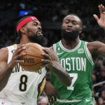 New Orleans Pelicans forward Naji Marshall (8) drives to the basket against Boston Celtics during the first half of an NBA basketball game, Wednesday, Jan. 11, 2023, in Boston. (AP Photo/Charles Krupa)
