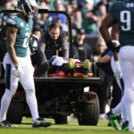 
              Philadelphia Eagles defensive end Josh Sweat (94) is carted off the field after being injured in the first half of an NFL football game against the New Orleans Saints in Philadelphia, Sunday, Jan. 1, 2023. (AP Photo/Matt Slocum)
            