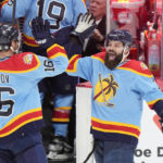 
              Florida Panthers center Aleksander Barkov (16) and defenseman Radko Gudas (7) congratulate each other after the Panthers beat the Boston Bruins 4-3 in an overtime period of an NHL hockey game, Saturday, Jan. 28, 2023, in Sunrise, Fla. (AP Photo/Wilfredo Lee)
            