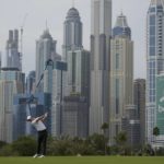 
              Rory McIlroy of Northern Ireland plays his second shot on the 13th hole during the first round of the Dubai Desert Classic, in Dubai, United Arab Emirates, Thursday, Jan. 26, 2023. (AP Photo/Kamran Jebreili)
            