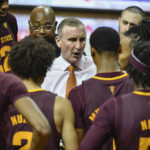 Arizona State head coach Bobby Hurley, center, talks with his players during a timeout during the first half of an NCAA college basketball game against Oregon, Thursday, Jan. 12, 2023, in Eugene, Ore. (AP Photo/Andy Nelson)