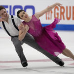 
              Michael Parsons, left, and Caroline Green perform during the free dance at the U.S. figure skating championships in San Jose, Calif., Saturday, Jan. 28, 2023. (AP Photo/Tony Avelar)
            