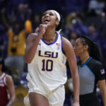 
              LSU forward Angel Reese (10) celebrates after a turnover in the second half an NCAA college basketball game against Arkansas in Baton Rouge, La., Thursday, Jan. 19, 2023. LSU won 79-76. (AP Photo/Gerald Herbert)
            