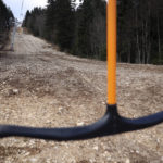
              Cable car anchor hangs empty on a ski track without any snow on Bjelasnica mountain near Sarajevo, Bosnia, Wednesday, Jan. 4, 2023. (AP Photo/Armin Durgut)
            