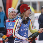 From left, second placed United States' Mikaela Shiffrin and the winner Germany's Lena Duerr celebrate after completing an alpine ski, women's World Cup slalom, in Spindleruv Mlyn, Czech Republic, Sunday, Jan. 29, 2023. (AP Photo/Giovanni Maria Pizzato)