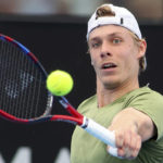 
              Canada's Denis Shapovalov makes a backhand return to Russia's Roman Safiullin during their Round of 16 match at the Adelaide International Tennis tournament in Adelaide, Australia, Thursday, Jan. 5, 2023. (AP Photo/Kelly Barnes)
            
