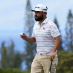 
              J.J. Spaun acknowledges the gallery after making his putt on the third green during the first round of the Tournament of Champions golf event, Thursday, Jan. 5, 2023, at Kapalua Plantation Course in Kapalua, Hawaii. (AP Photo/Matt York)
            