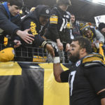 Pittsburgh Steelers defensive tackle Cameron Heyward greets fans as he heads to the locker room following an NFL football game against the Cleveland Browns in Pittsburgh, Sunday, Jan. 8, 2023. The Steelers won 28-14. (AP Photo/Don Wright)
