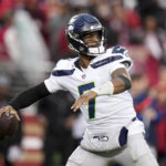 Seattle Seahawks quarterback Geno Smith (7) passes against the San Francisco 49ers during the second half of an NFL wild card playoff football game in Santa Clara, Calif., Saturday, Jan. 14, 2023. (AP Photo/Godofredo A. Vásquez)