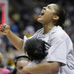 
              Connecticut's Maya Moore celebrates following the women's NCAA Final Four college basketball championship game against Stanford, April 6, 2010, in San Antonio. Moore has officially decided to retire from playing basketball, making her announcement on “Good Morning America” on Monday, Jan. 16, 2023. (AP Photo/Sue Ogrocki)
            