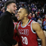 
              Loyola Marymount guard Cam Shelton (20) celebrates the team's 68-67 win against Gonzaga after an NCAA college basketball game, Thursday, Jan. 19, 2023, in Spokane, Wash. (AP Photo/Young Kwak)
            