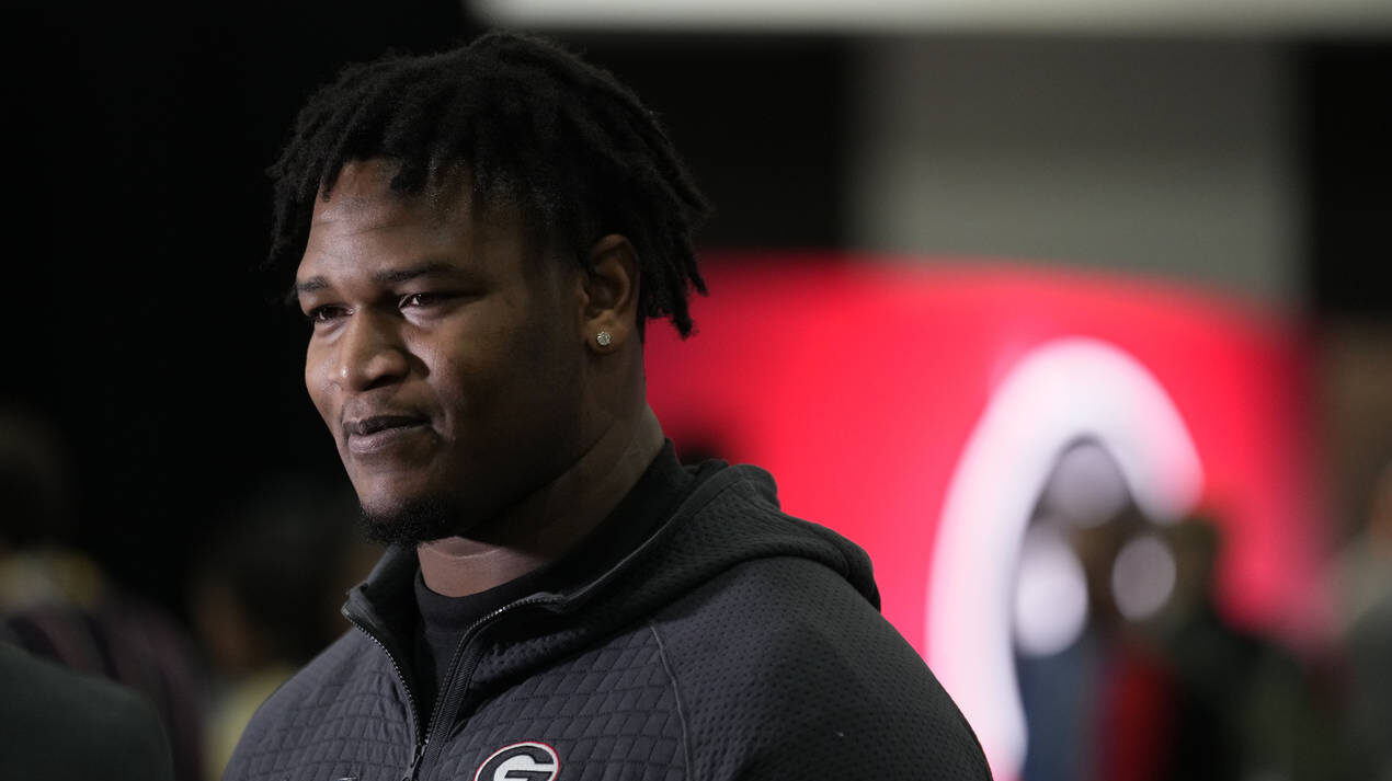 Georgia defensive lineman Jalen Carter speaks during a media day ahead of the national championship...